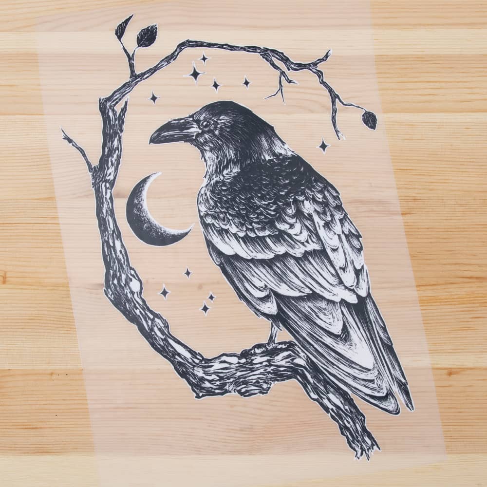 Vuorella kangaskauppa, silityskuvat - Korppi silityskuva