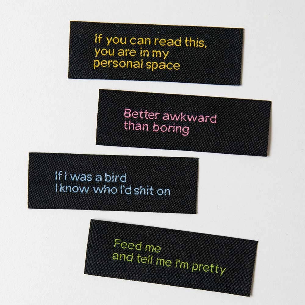 Vuorella kangaskauppa -Ompelumerkit, mustat