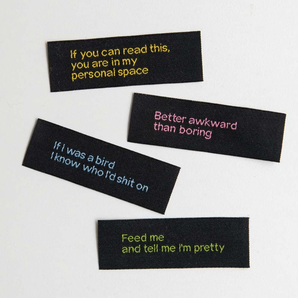 Vuorella kangaskauppa -Ompelumerkit, mustat