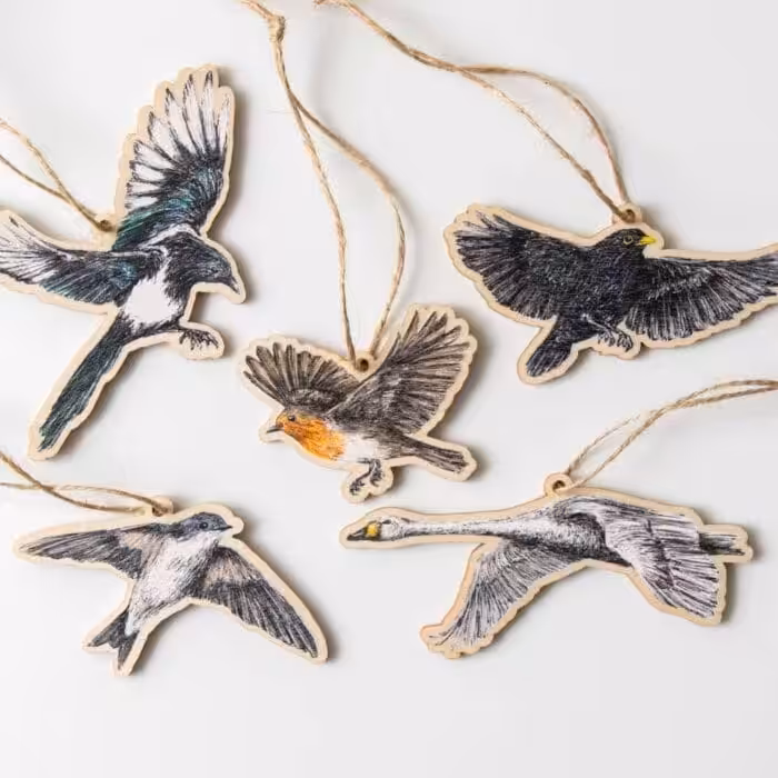 Vuorella kangaskauppa -Koristeet, koristelinnut