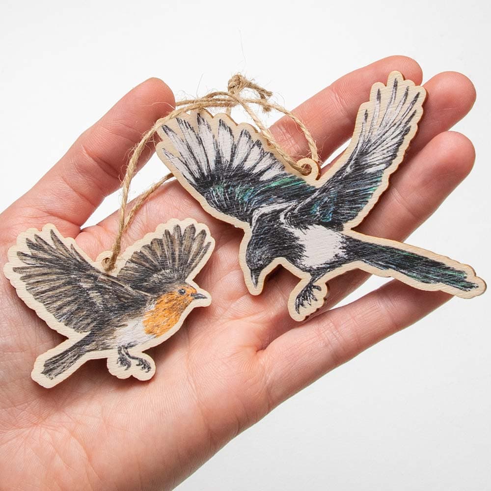 Vuorella kangaskauppa -Koristeet, koristelinnut