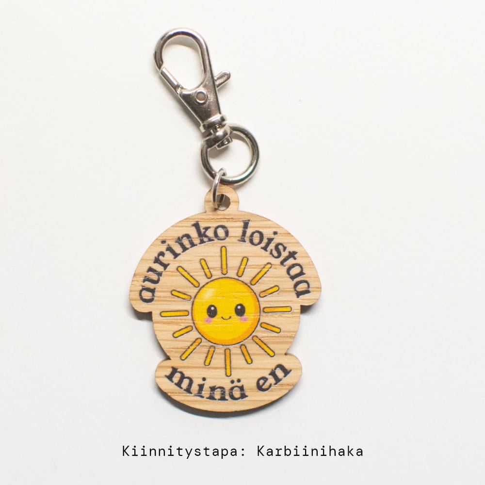 Vuorella kangaskauppa -Koristeet, avaimenperä Aurinko loistaa..